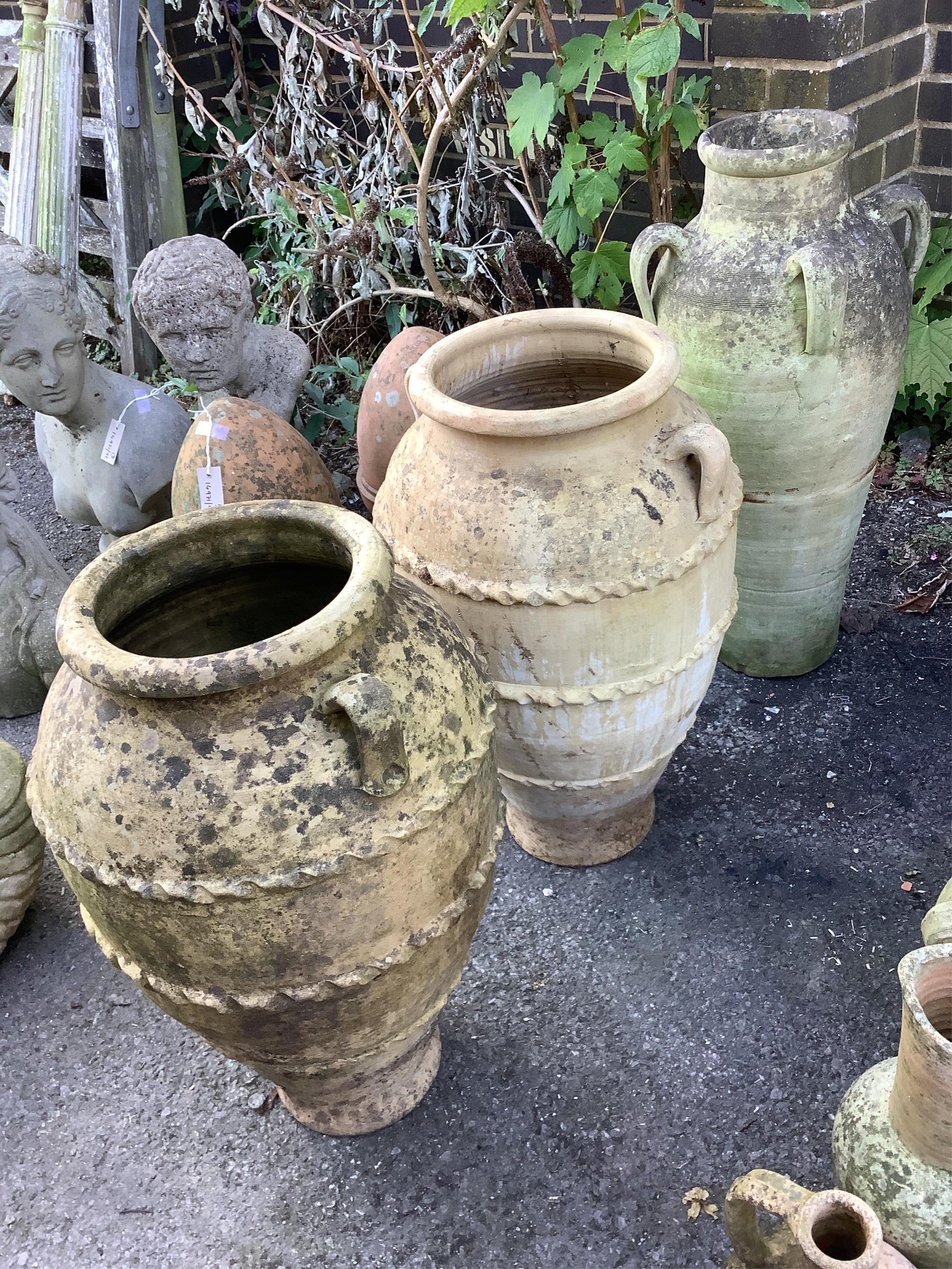 Three terracotta amphora urns, largest height 79cm. Condition - poor to fair